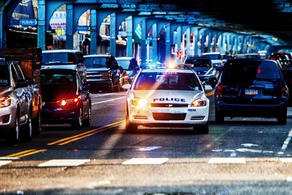 Philadelphia police patrol a stretch of Kensington Avenue. Since January, police have made 633 prostitution arrests.