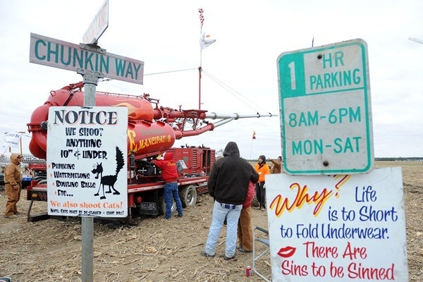 <p><p>The Emancipator team sets up at the intersection of Punkin Lane and Chunkin Way. (Chuck Snyder/for NewsWorks)</p></p>
