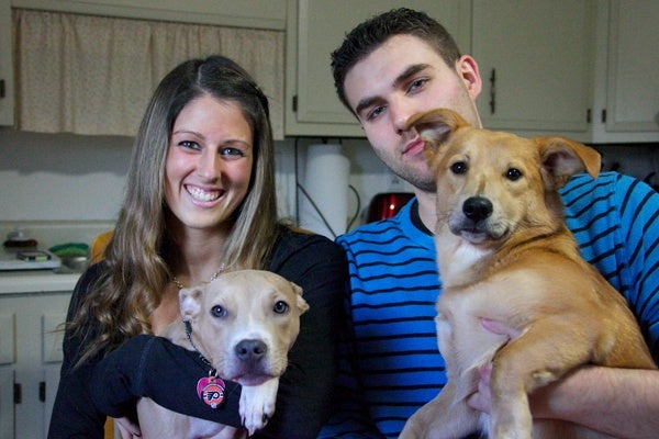 <p><p>Left to right: Marissa Eldridge, Cairo, J.T. Donnell, and Bandit, in their Chester Springs, Pa., home. (Nathaniel Hamilton/for NewsWorks)</p></p>
