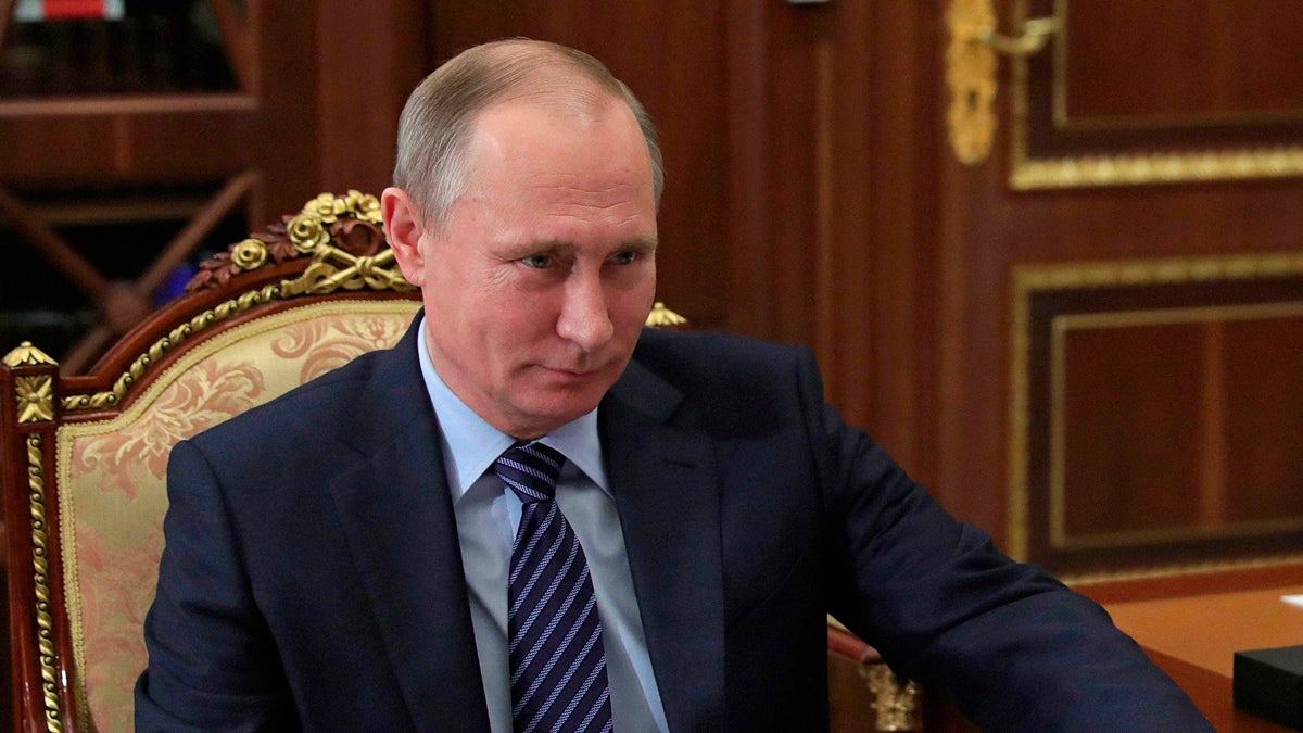 Russian President Vladimir Putin is shown in the Kremlin in Moscow (AP)