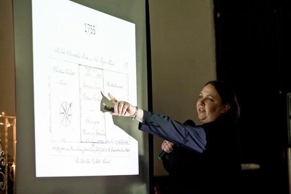 <p><p>Archaeologist Mary Alfson Tinsman points to slides showing historical maps of Potter's Field. (Brad Larrison/for NewsWorks)</p></p>
