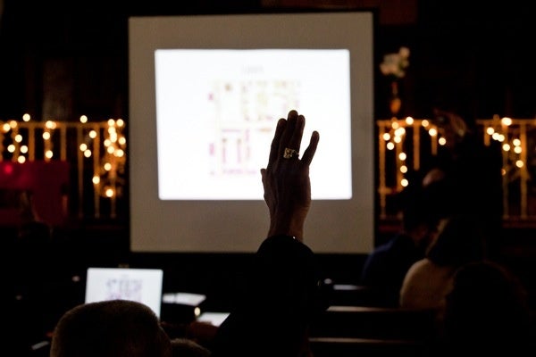 <p><p>A man raises his hands in the hopes of voicing his concerns for the Potter's Field site. (Brad Larrison/for NewsWorks)</p></p>
