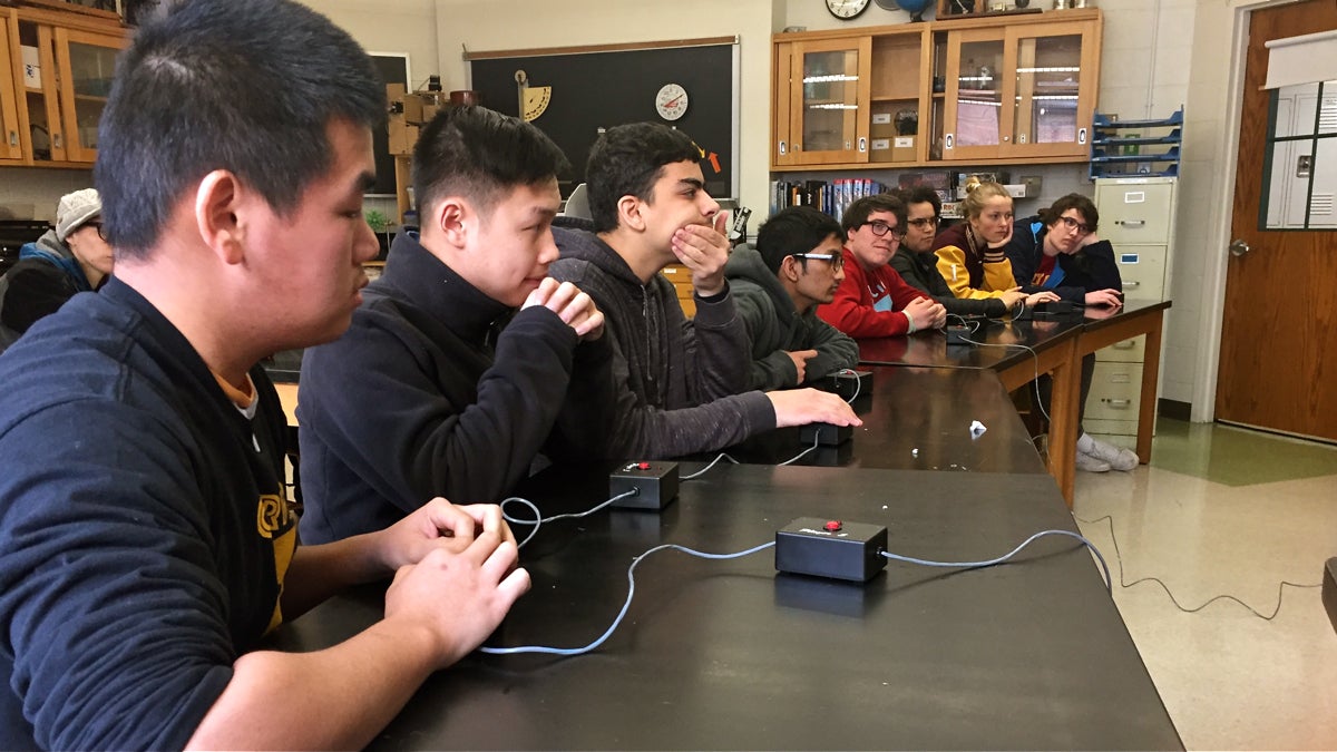  From left to right, William Zhang, Su Ly, Hasan Taloui, and Mohammed Imon of the Carver HS Quizbowl team play against Central HS at the city's Quizbowl championship. (Avi Wolfman-Arent/WHYY) 