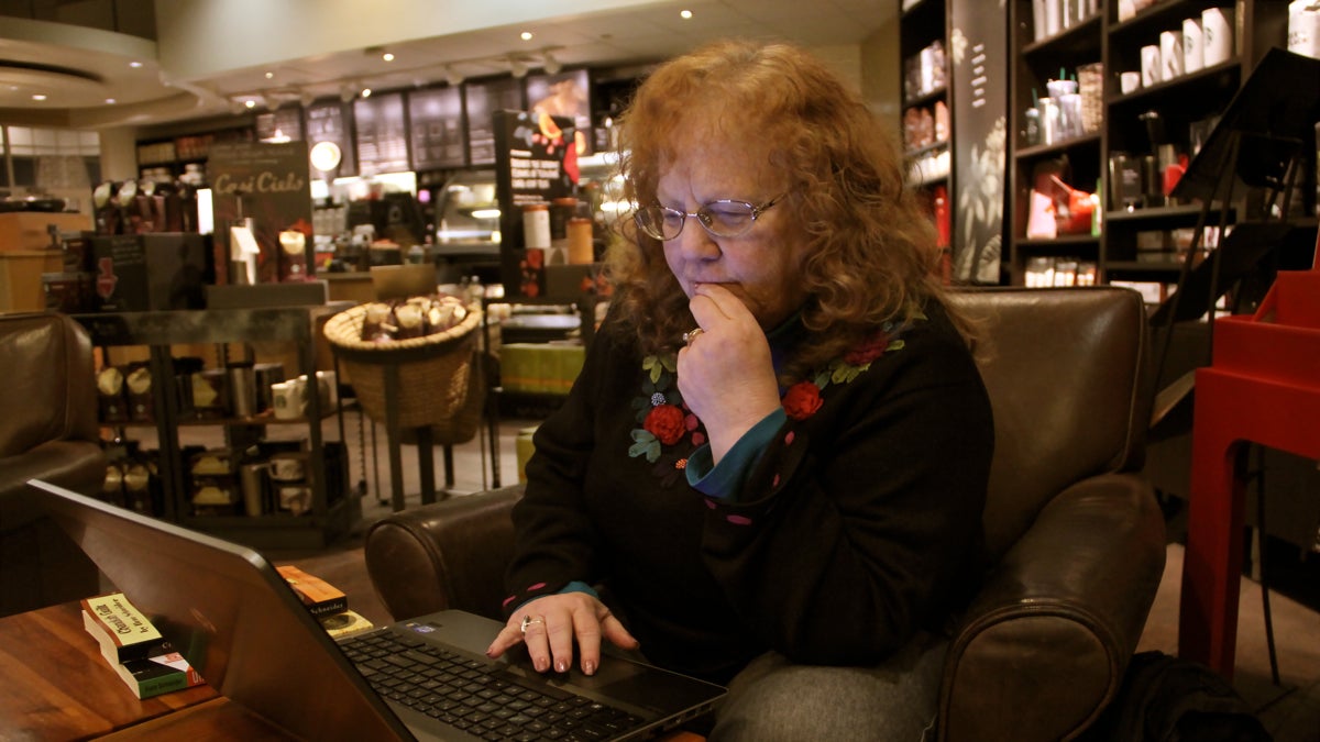  Ilene Schneider likes to work at a Starbucks near her home. (Emma Lee/WHYY) 