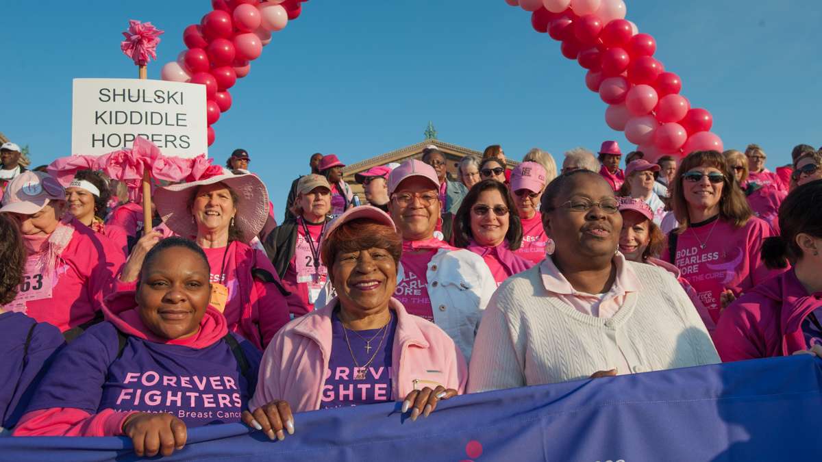 Participants in the Survivors Parade of Pink and Salute to Forever Fighters prepare to walk down the steps of the Philadelphia Museum of Art.