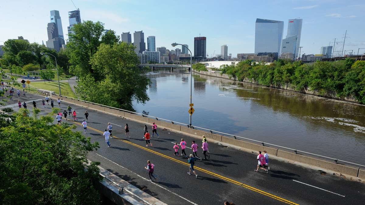 Runners cross the Schuylkill River during the last leg of the 5K race.