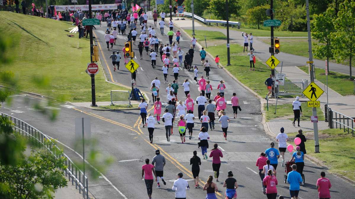 Runners head for the finish line of the 5K event during the Race for the Cure.