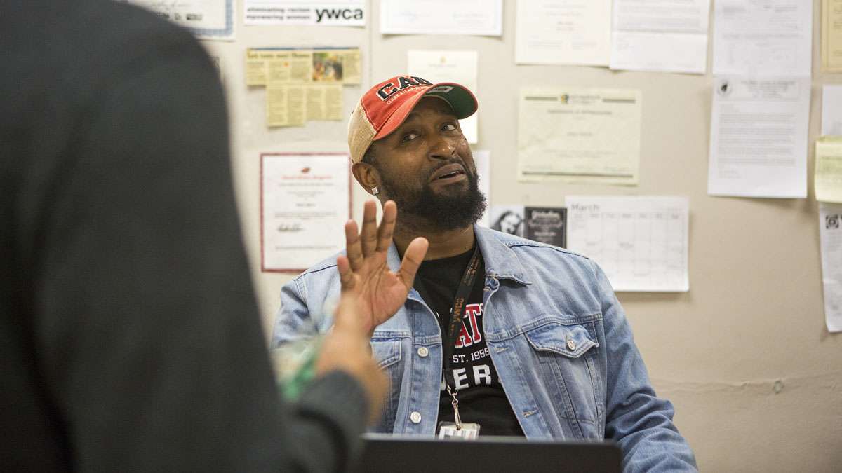 Mike Smith grew up in York, and works with kids to deal with obstacles they face growing up here – including dealing with racial tension. As part of his job, Mike runs an after school college prep program, the York Temple Guard program and spends time counseling families on where to send their kids to high school. (Jessica Kourkounis/For Keystone Crossroads)