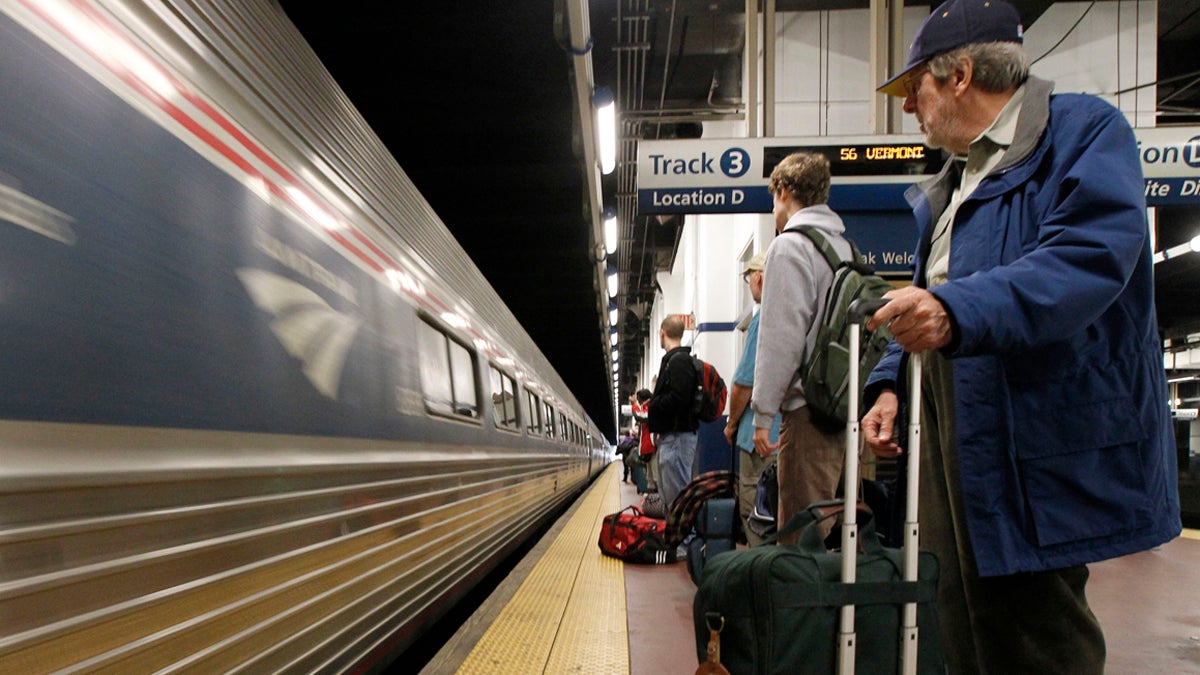  Passengers wait to board an Amtrak train at 30th Street Station in Philadelphia.  Pennsylvanians wants more train routes and more frequent trains on existing routes. Those proposals will take time and money. (AP File Photo/Alex Brandon) 
