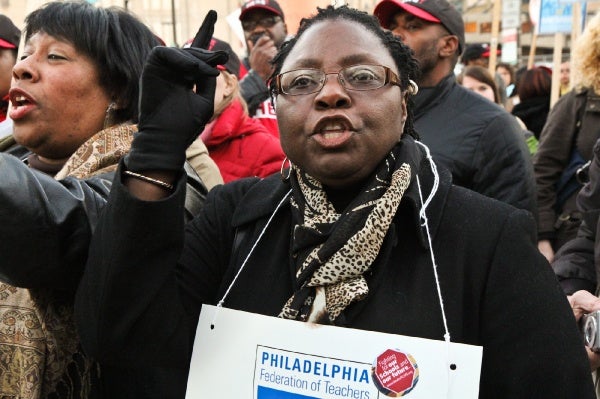 <p><p>AMY Northwest teacher Theresa Lewis-King chanted "shame on you" with the crowd. (Kimberly Paynter/WHYY)</p></p>
