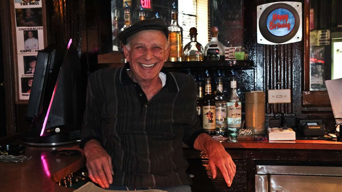 Tony Coccerino, bartender of 25 years, works the morning shift and says Ray's is a 'friendly bar, a neighborhood bar' that treats people right. (Kimberly Paynter/WHYY)