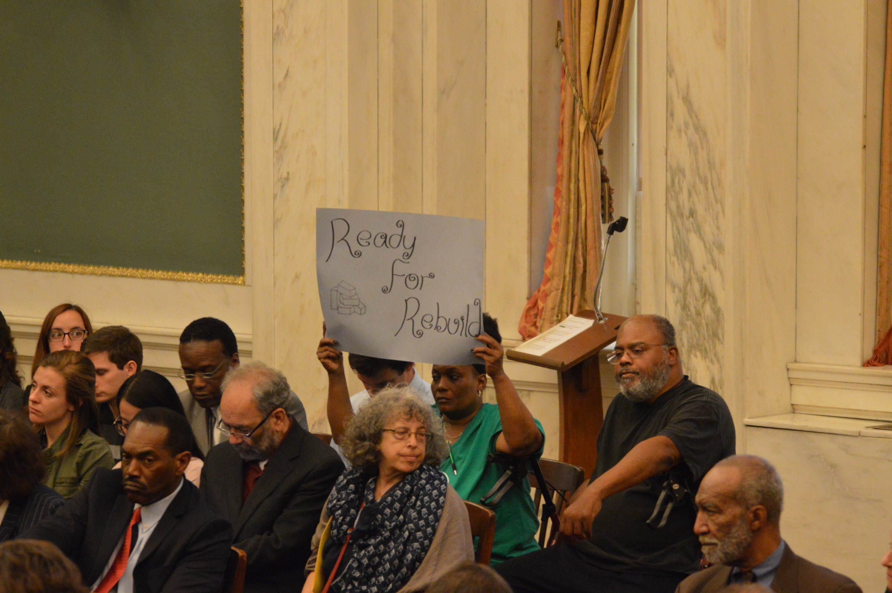  Meeting attendee sends message to council during hearing on Mayor Kenney's Rebuild initiative (Tom MacDonald/WHYY) 