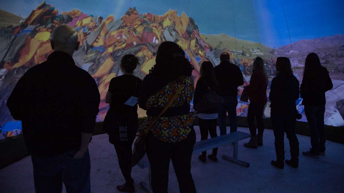 Patrons enter a dome for a 360-degree video experience which introduces them to the journeys of migrants worldwide.