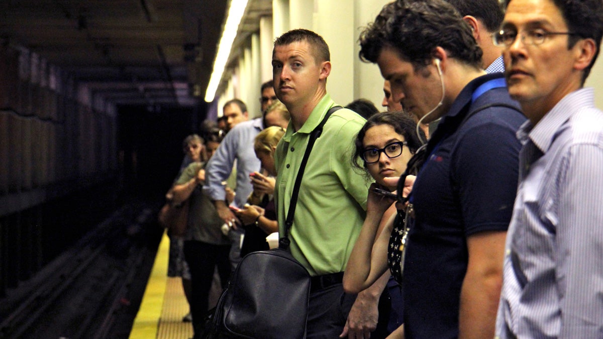 Commuters wait for a train at Suburban Station in Philadelphia. Beginning Monday