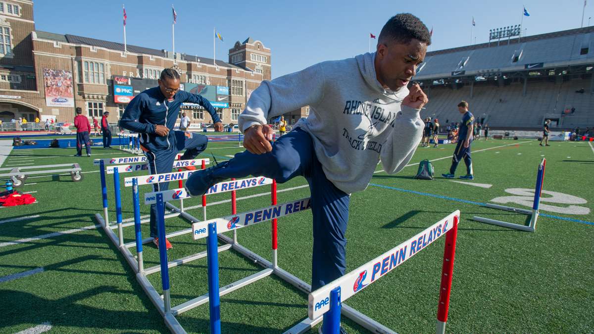 Adam Franklin of the University of Rhode Island warms up prior to the College Men's 400-meter hurdles championship. Franklin placed 8th in the event.