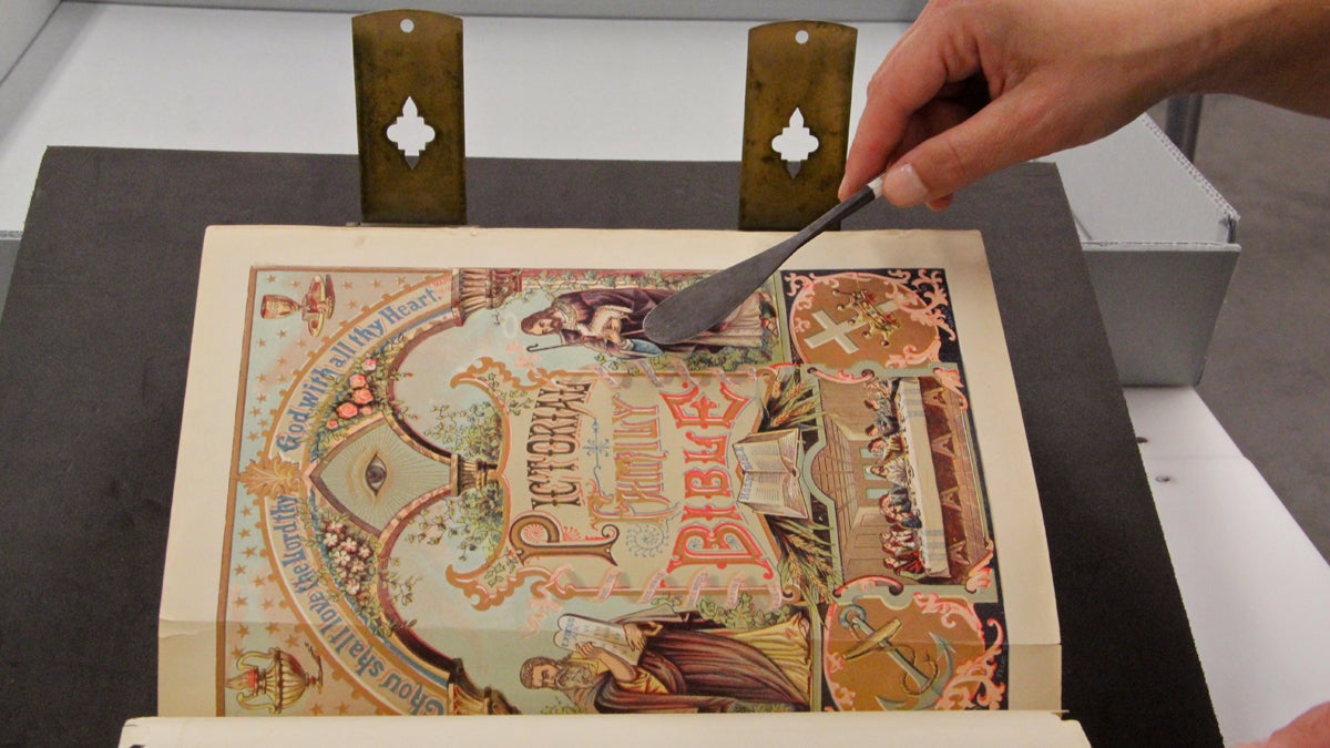 The illustrations in a family bible from 1892 remain vivid. (Emma Lee/for NewsWorks)