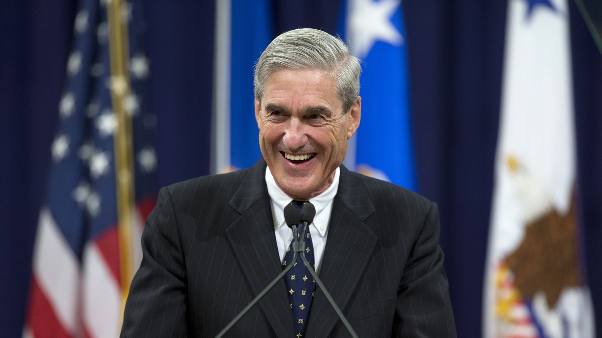  Robert Mueller is shown in 2013 speaking at the Justice Department in Washington during a farewell ceremony on the occasion of his stepping down as FBI Director. (AP Photo/Evan Vucci) 