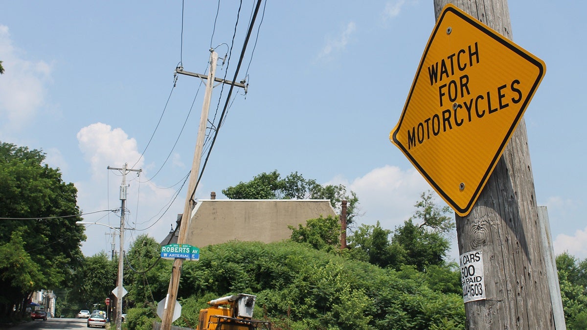  A warning sign near the scene of Tuesday morning's fatal motorcycle accident. (Matthew Grady/for NewsWorks) 