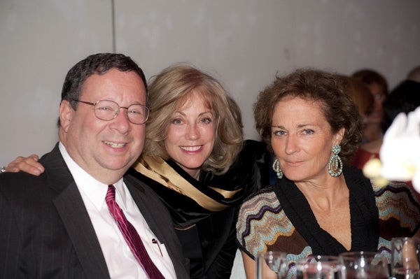 <p><p>David Cohen of Comcast, Rikki Saunders, and Gretchen Burke at Suzanne and Ralph Roberts' 70th wedding anniversary celebration (Photo courtesy of Susan Beard Design)</p></p>
