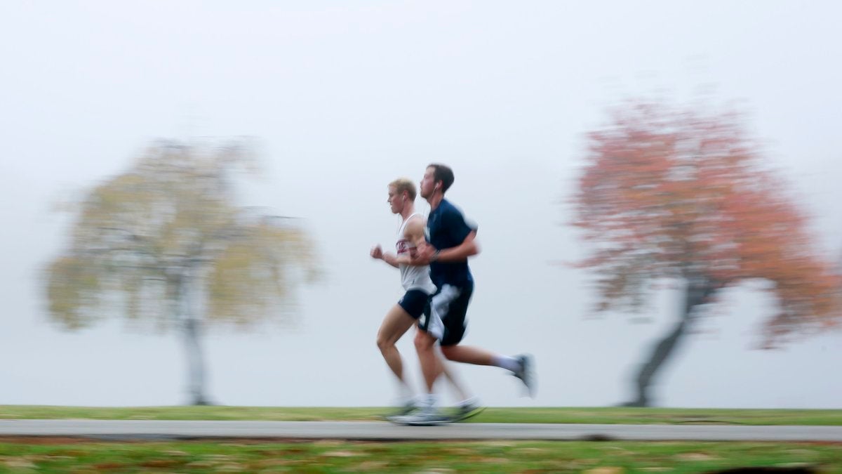  Men run along the banks of the Schuylkill River in Philadelphia. (AP Photo/Matt Rourke) 