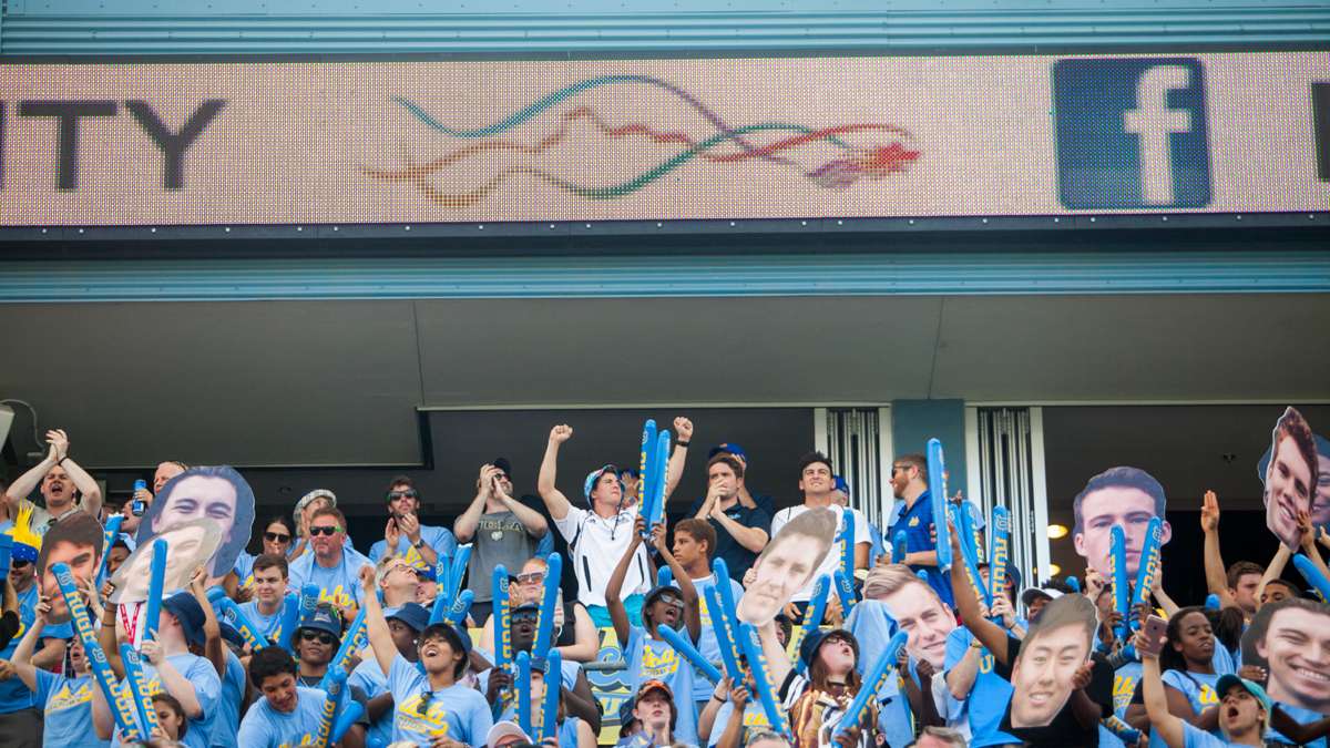 UCLA fans cheer on their team as they cruised to victory over University of Michigan.
