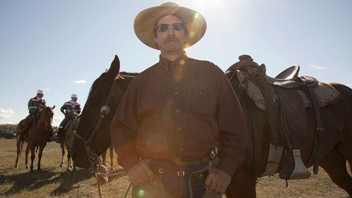  Shawn Weekes, of Texas, is one of a handful of American cowboys currently working on Miratorg farms and helping train Russian cowboys. (Irina Zhorov/WHYY) 