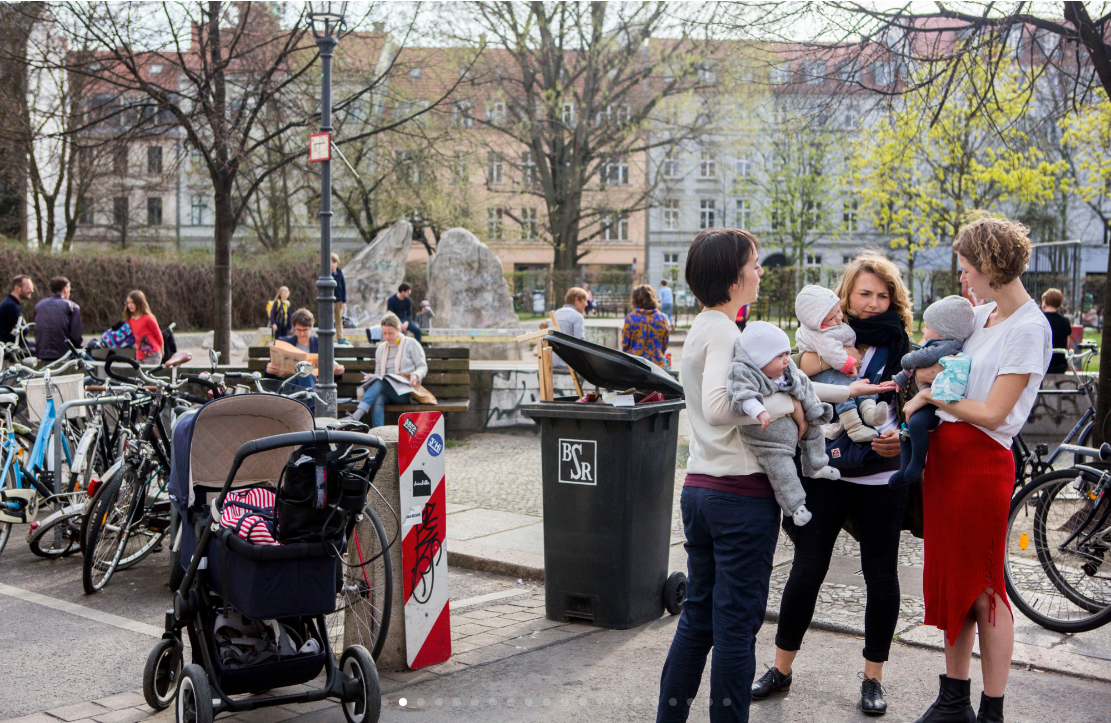 Mothers socialize with one another in a neighborhood park with their children in Old Mitte, just on the other side of the former Berlin wall from Wedding. (Jessica Kourkounis/For Keystone Crossroads)