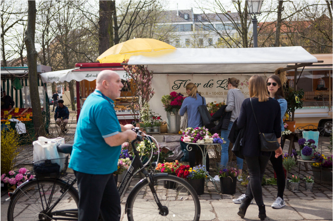 Flowers and artisanal goods and food are sold at Arkonaplatz Markt, a popular outside market, on the wealthier side of Mitte’s social divide. (Jessica Kourkounis/For Keystone Crossroads)