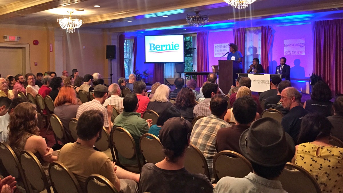  Bernie Sanders supporters gather at 1199C Union Hall in Philadelphia for a televised address by the Democratic presidential hopeful. (Bobby Allyn/WHYY) 