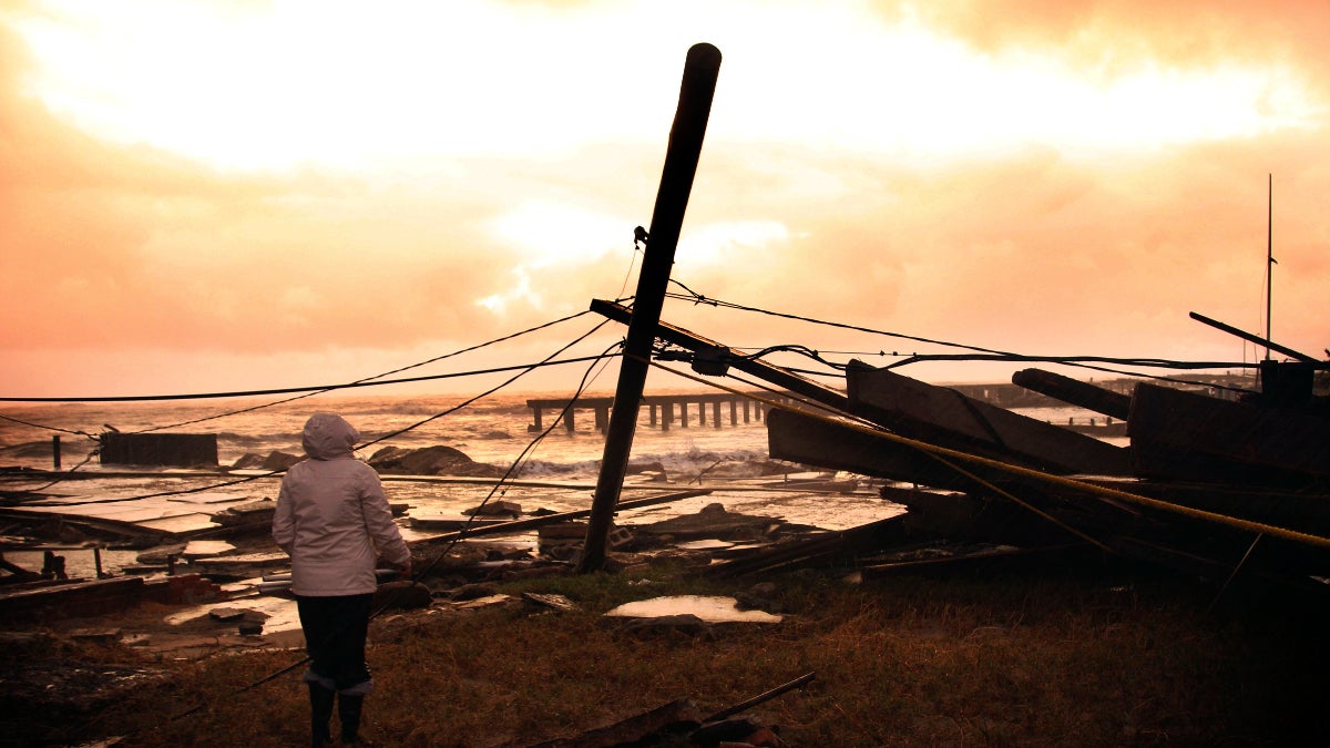  Kim Johnson looks over the destruction near her seaside apartment in Atlantic City, N.J., Tuesday, Oct. 30, 2012. (AP Photo/Seth Wenig) 