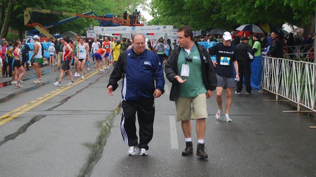  Jim Marino during the Broad Street Run (left) (Courtesy of Independence Blue Cross) 