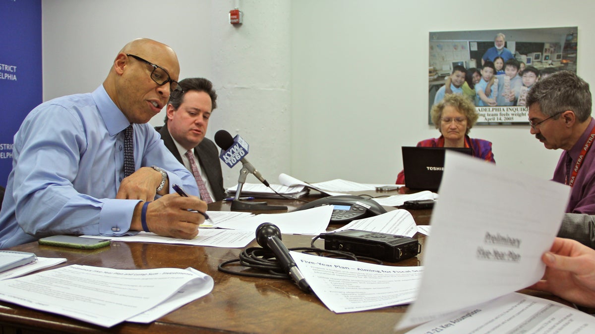 Philadelphia schools Superintendent William Hite and Chief Financial Officer Uri Monson review the budget with reporters at School District Headquarters Thursday. (Emma Lee/WHYY)