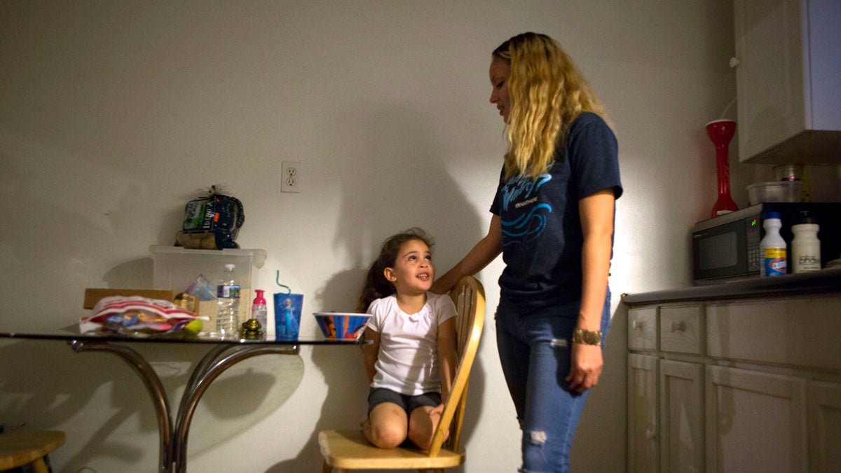  Savannah and Layla in the kitchen of the family’s Kensington home. (Jessica Kourkounis/For Keystone Crossroads) 