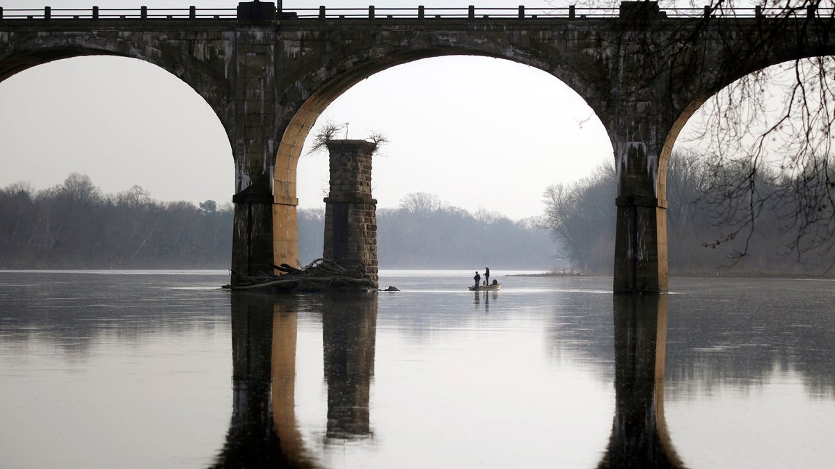  People take advantage of unseasonably warm weather to fish on the Delaware River near Yardley, Pa. (AP Photo/Mel Evans) 