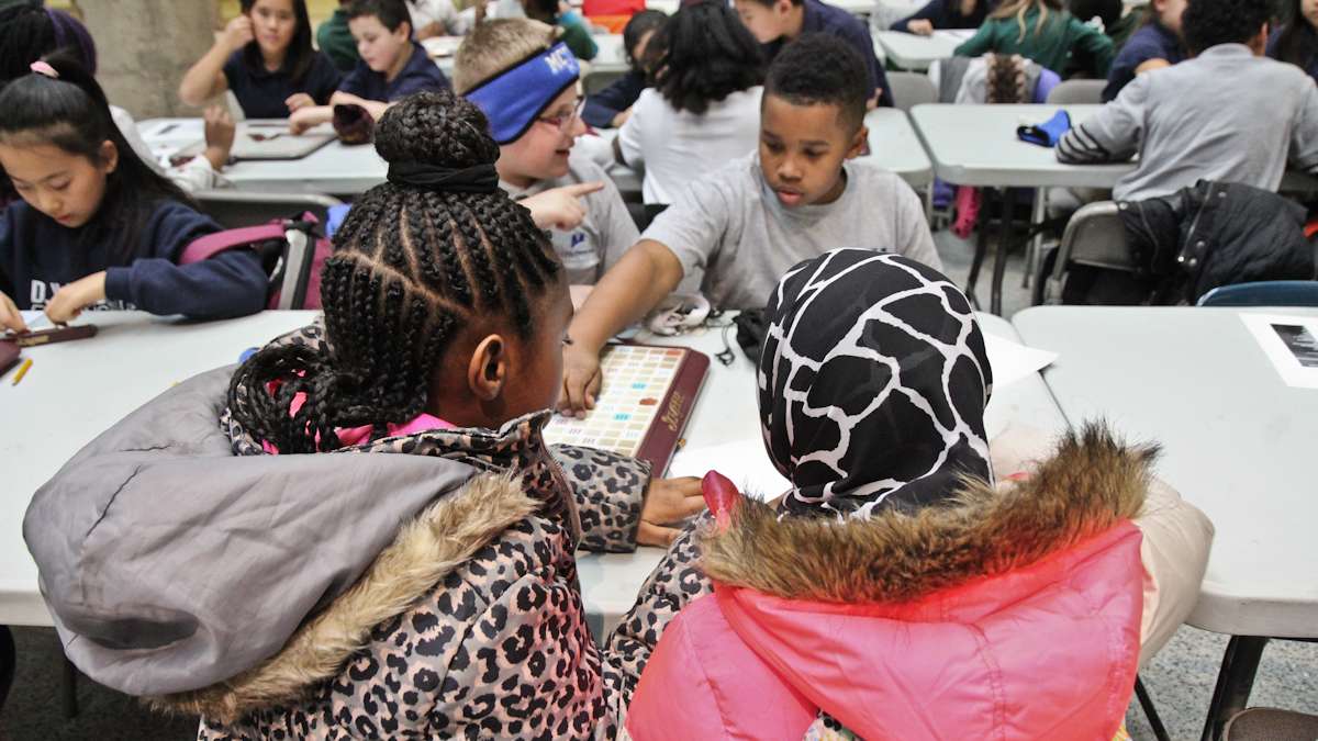 Kids at the ASAP Scrabble tournament say that making friends is a great benefit of the game. (Kimberly Paynter/WHYY)
