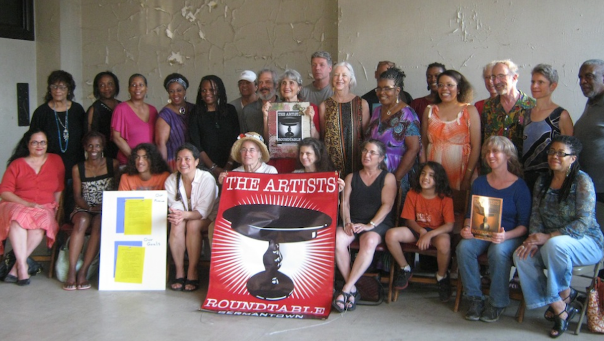  Members of the Germantown Artists Roundtable pose for a group portrait inside the since-closed Town Hall. (Alaina Mabaso/for NewsWorks) 