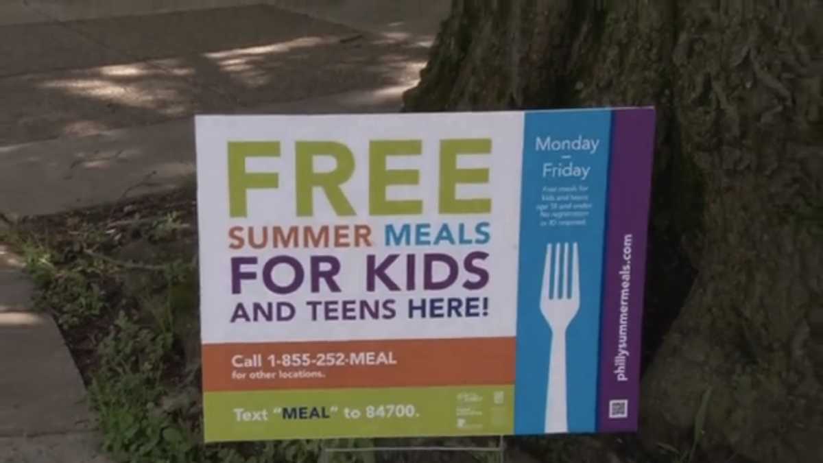 A sign outside Lovett notes that free meals are available for kids during the summer.