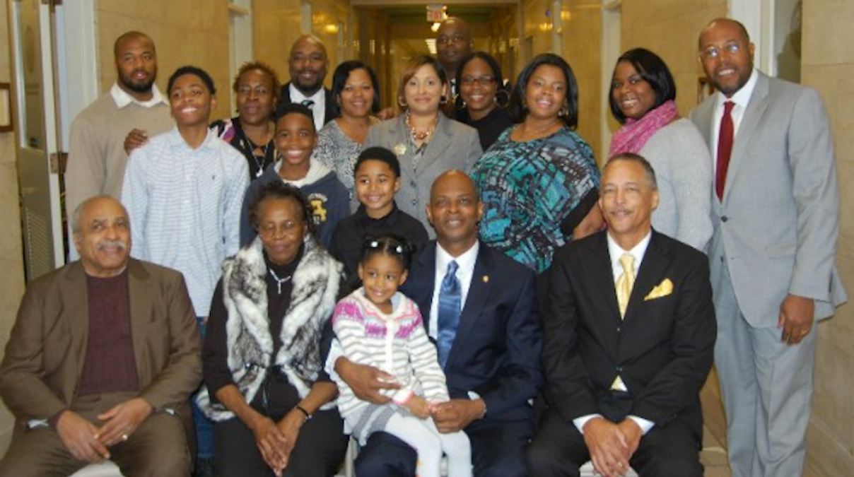 State Rep. Stephen Kinsey (front row, center) was surrounded by friends and family after being sworn into office in January. (Courtesy of Rep. Kinsey) 