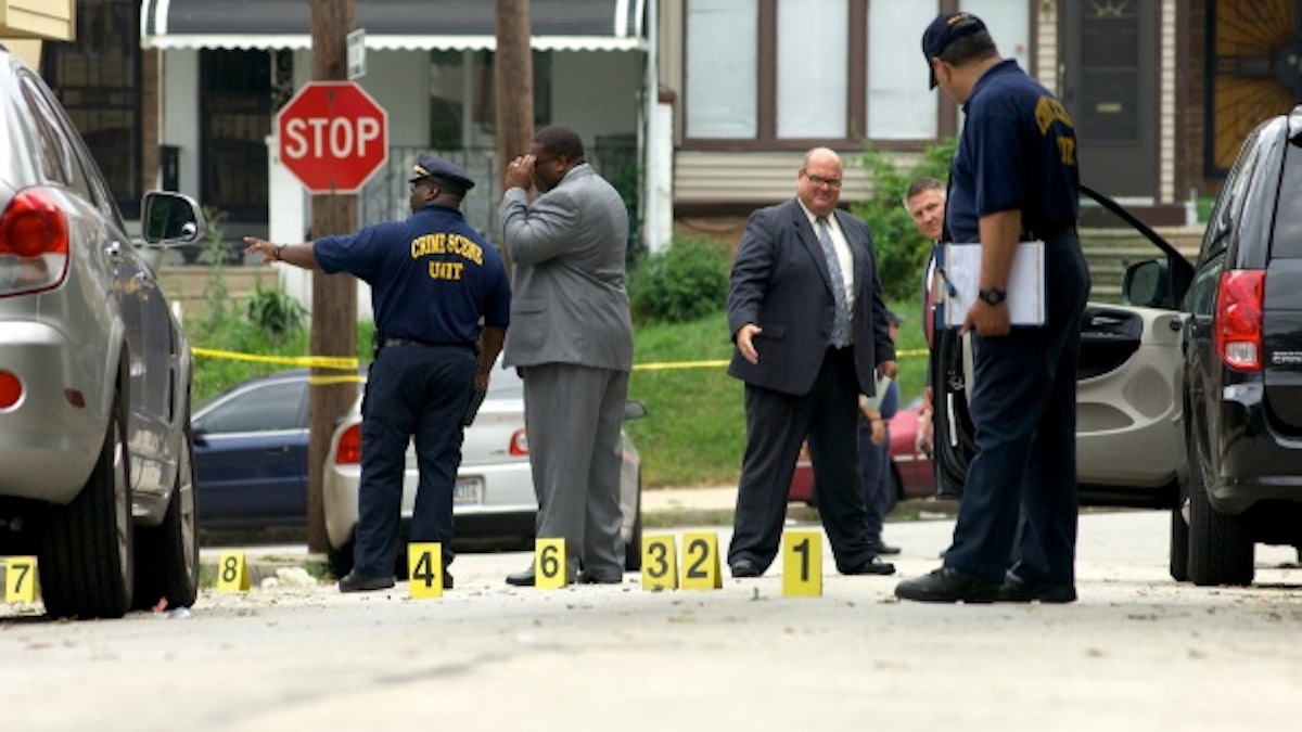  Investigators at the scene of last week's police-involved shootout in East Mount Airy. (Bas Slabbers/for NewsWorks) 