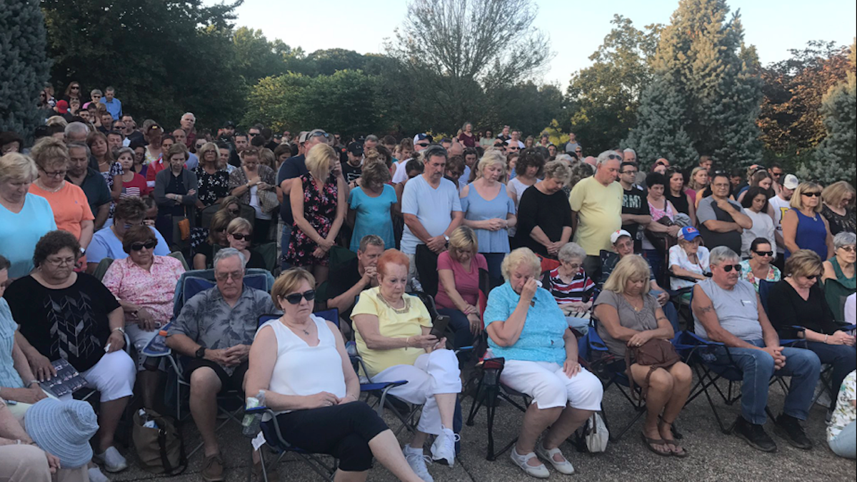  Hundreds show up to vigil in Bucks County to remember the four missing young men who were murdered by two cousins here. (Bobby Allyn / WHYY) 