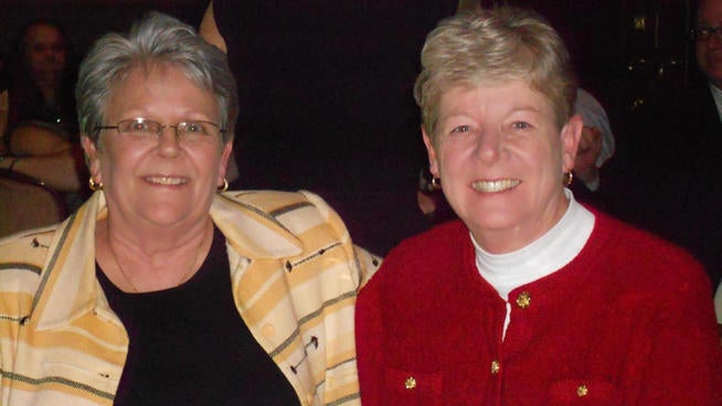  Victoria Bandy (left) sits next to partner of 24 years, Delaware State Senator Karen Peterson (right). 