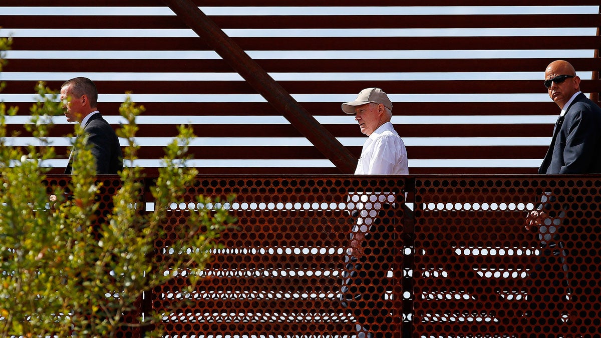  Attorney General Jeff Sessions, center, tours the U.S.-Mexico border with border officials, Tuesday, April 11, 2017, in Nogales, Ariz. (AP Photo/Ross D. Franklin) 