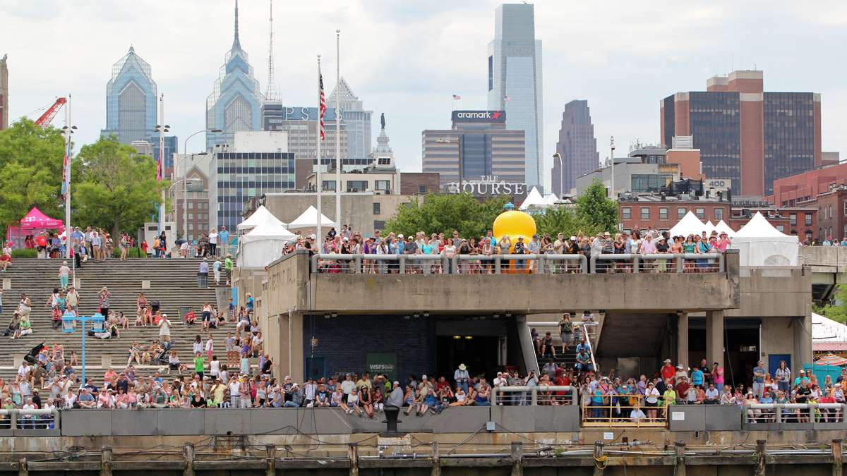 Crowds gather near the Independence Seaport Museum to watch the tall ships arrive in Philadelphia. (Emma Lee/WHYY)