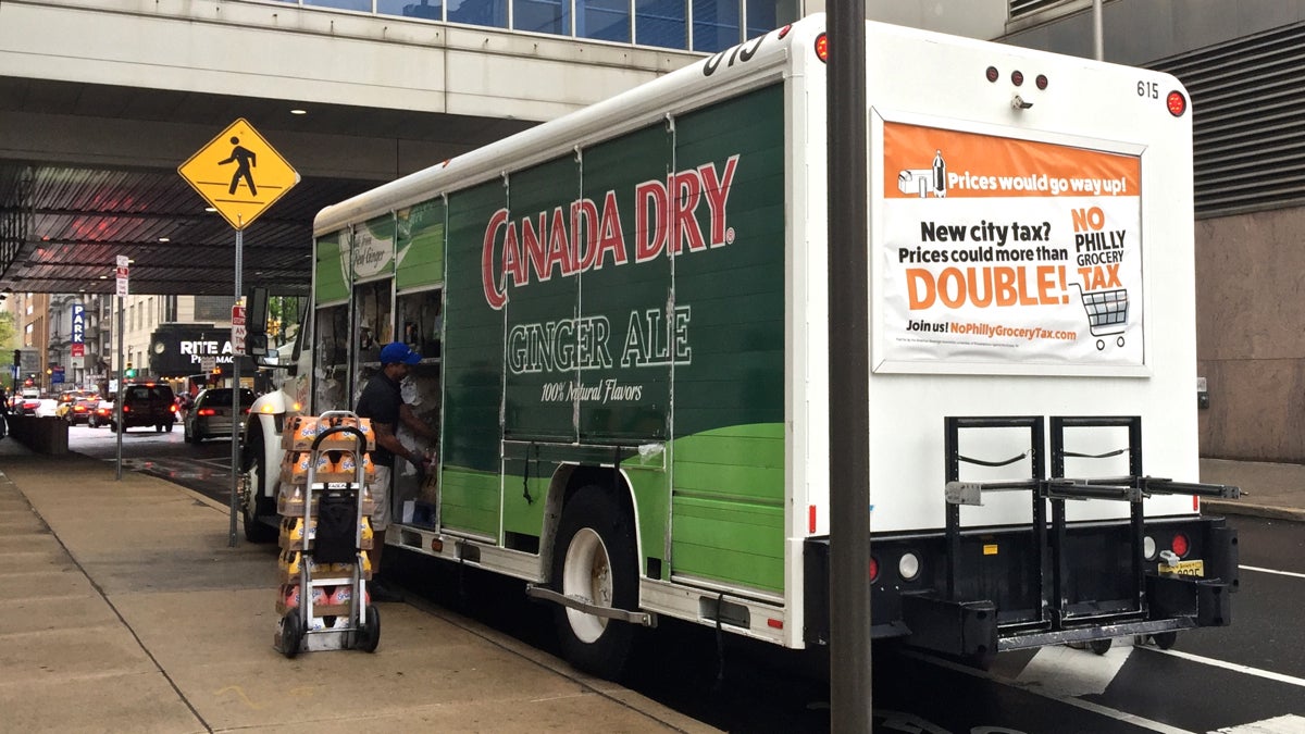 A soda truck unloads at 10th and Filbert streets. (Gene Sonn/WHYY)