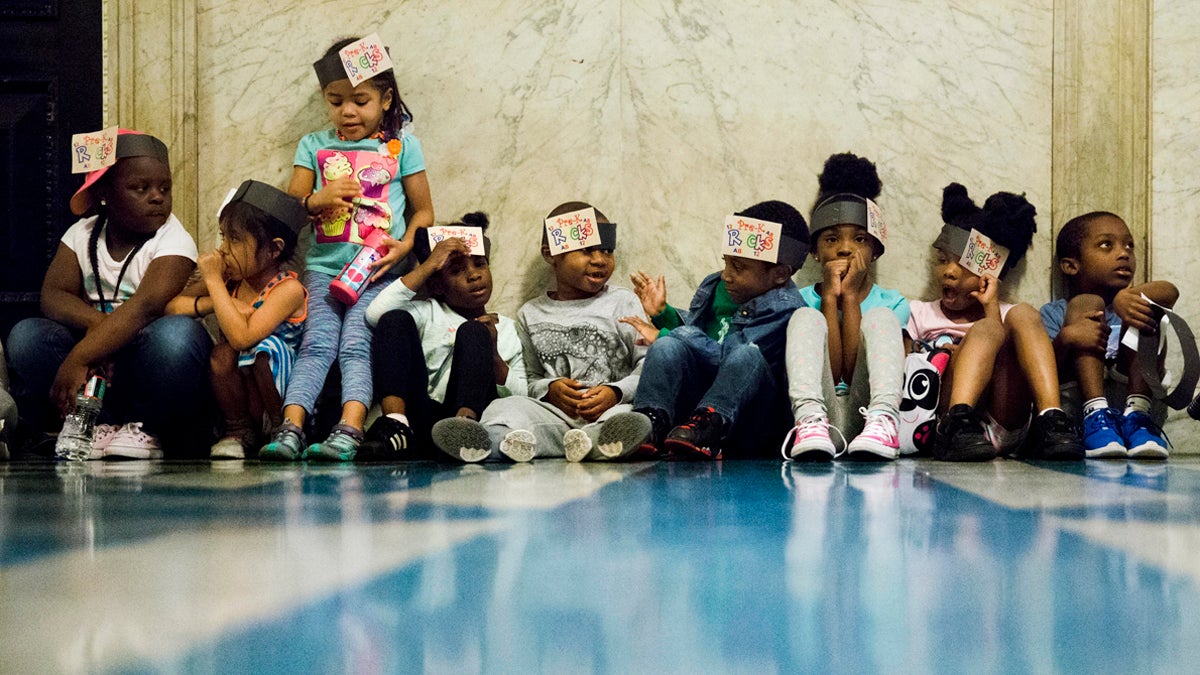 Children sat in the corridors of City Hall in Philadelphia, Wednesday, June 8, 2016. Philadelphia City Council is set to consider a sugary drink tax that Philadelphia Mayor Jim Kenney wants to pay for universal prekindergarten, community schools, park improvements, and fill a whole in the city's fund balance. (AP Photo/Matt Rourke) 