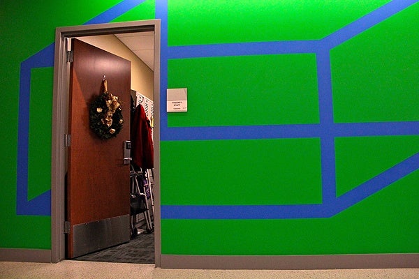 <p>Adapted for a hallway at Einstein Medical Center in Montgomery, a work by Sol LeWitt makes its way around necessary doorways. (Emma Lee/for NewsWorks)</p>
