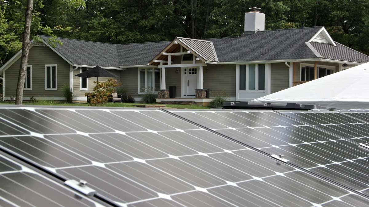 Alice De Tiberge's ranch home in Pennington is powered by solar panels and and a system that stores excess energy as hydrogen for use when sunlight is weak. (Emma Lee/WHYY)