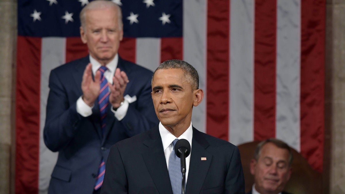  President Barack Obama delivers his State of the Union address to a joint session of Congress on Capitol Hill on Tuesday, Jan. 20, 2015, in Washington, as Vice President Joe Biden applauds and House Speaker John Boehner of Ohio listens. (AP Photo/Mandel Ngan, Pool) 