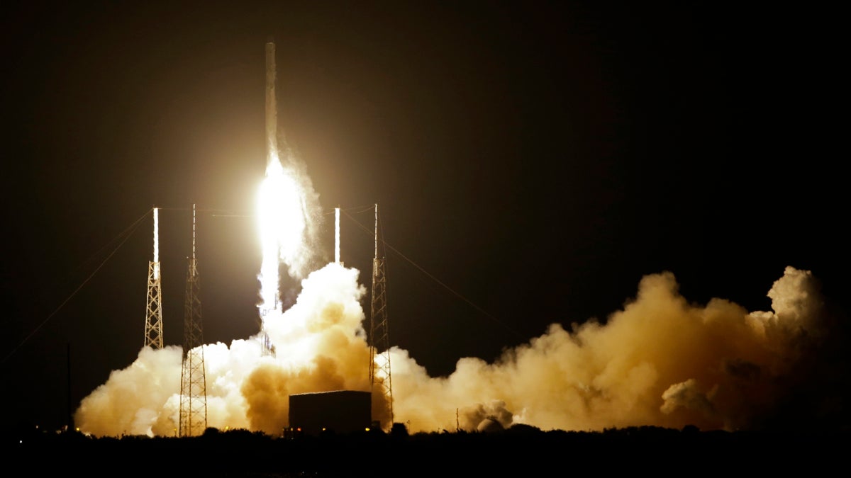 The Falcon 9 SpaceX rocket lifts off from Space Launch Complex 40 at the Cape Canaveral Air Force Station in Cape Canaveral, Fla., Saturday. SpaceX is on a resupply mission to the International Space Station. (AP Photo/John Raoux) 