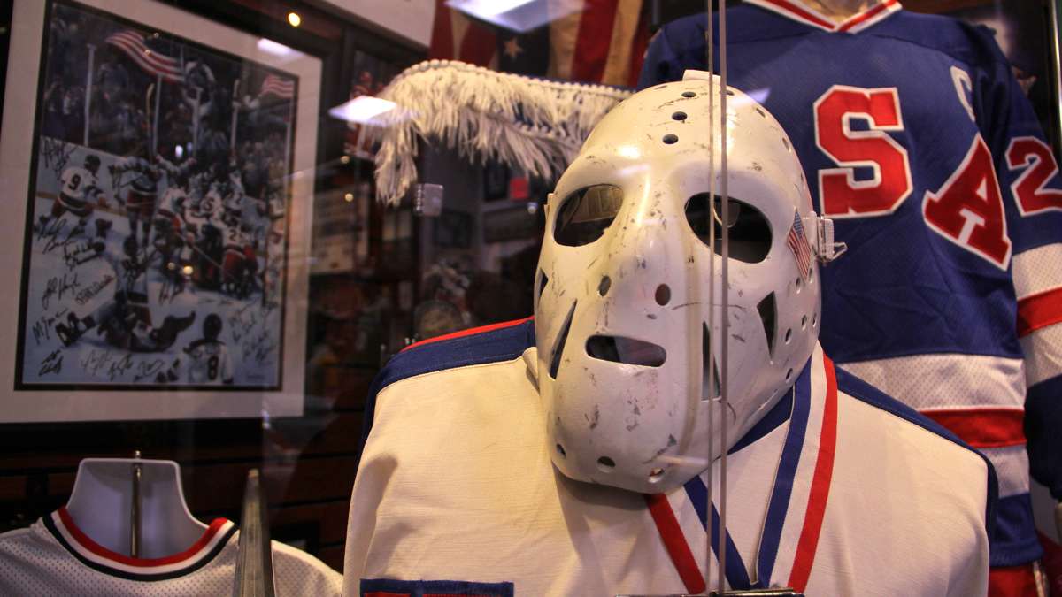 A section of the museum dedicated to olympic sports features mementos from the 1980 'Miracle on Ice' U.S.A hockey team, including the goalie mask worn by Jim Craig. (Emma Lee/WHYY)